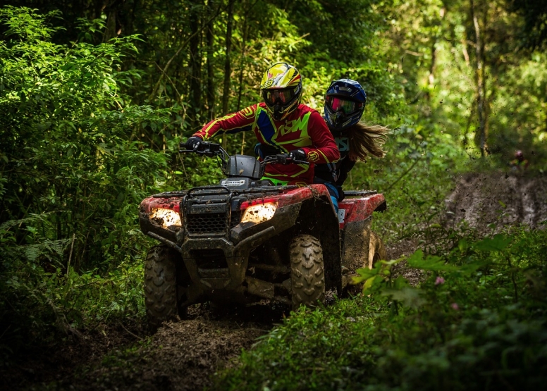 Couples Adventure Package Quad Biking Archery and Axe Throwing image 4